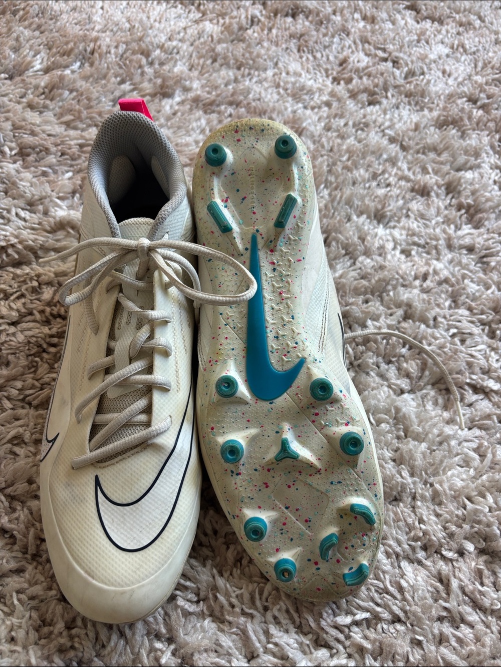 Nike Kids White Soccer Cleats with Teal Accents and Pink Pull Tab